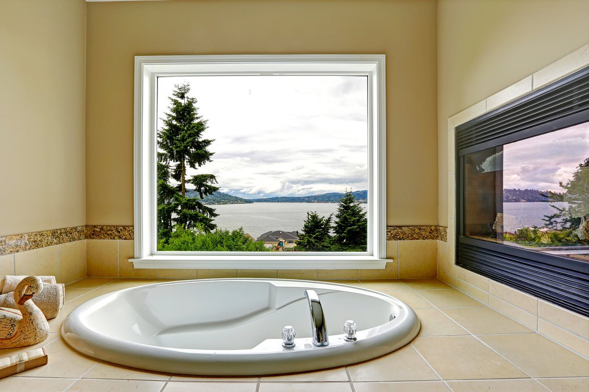 bigstock Luxury Bathroom With Fireplace 77650055